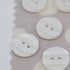 Button - Pearlised White - Self Stripe -14mm